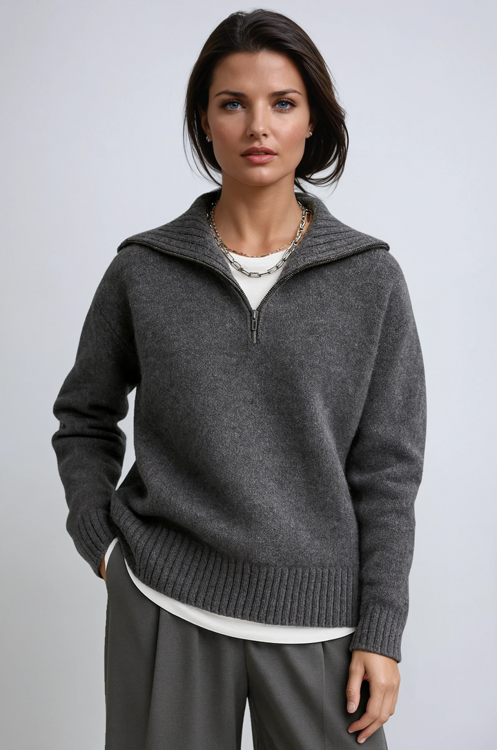 Women's Amara knitted zip-up turtleneck sweater in elegant grey. Cozy knitwear pullover for winter fashion.