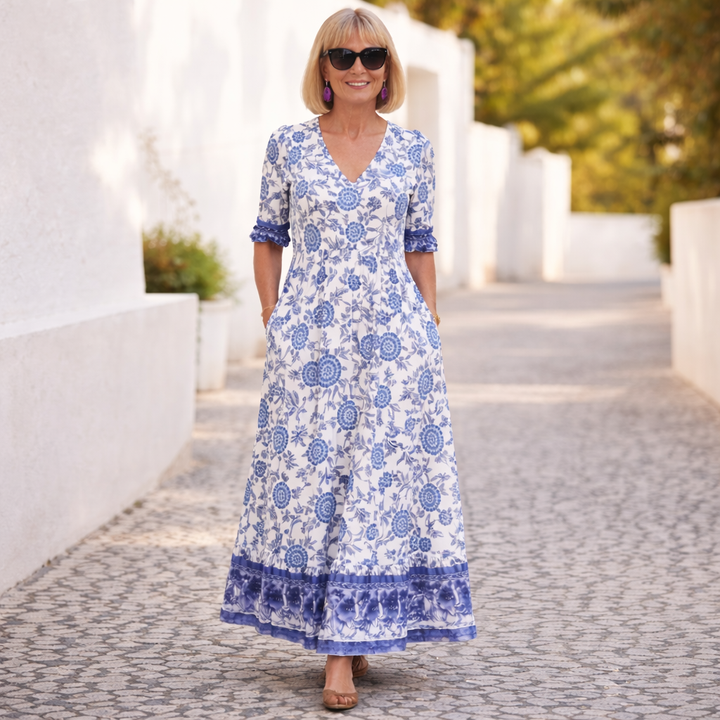 Elegant women's floral midi dress, perfect for summer casual or boho chic style with a flowing design.