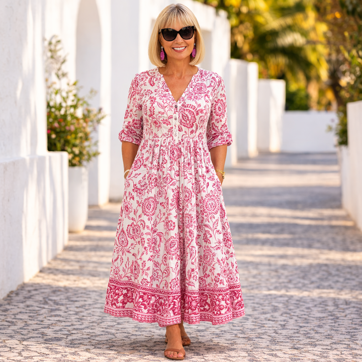 Women's comfortable print midi dress featuring a stylish floral design and v-neck for casual elegance.
