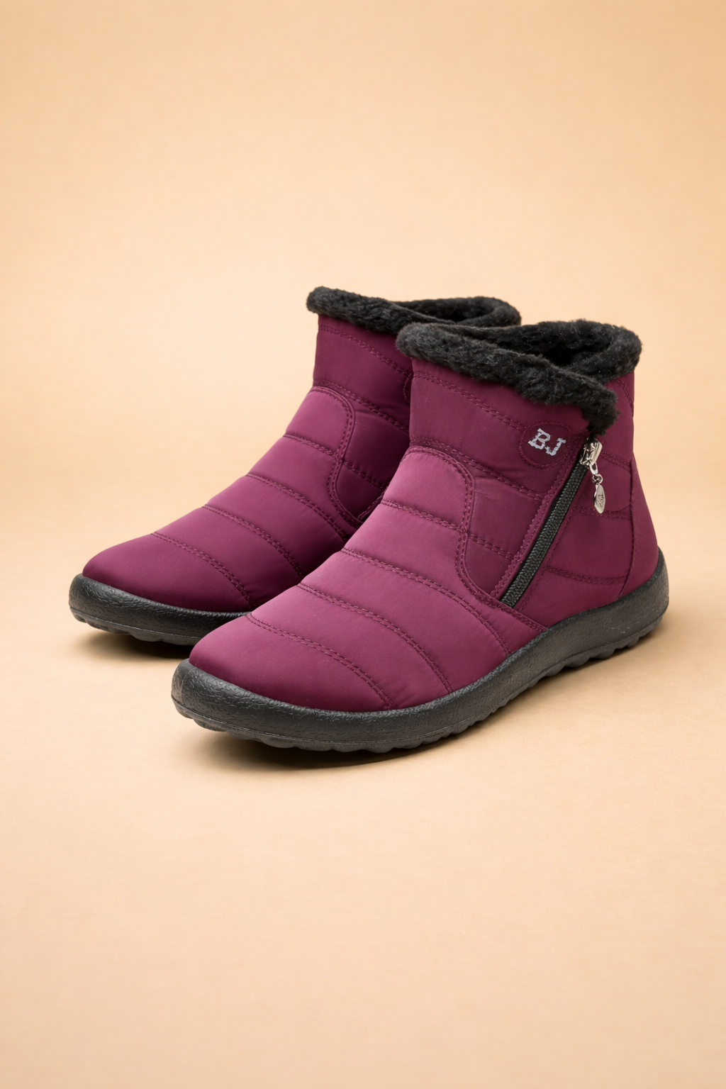 Stylish women's waterproof winter boots, cozy and non-slip, perfect for snowy days and winter fashion.