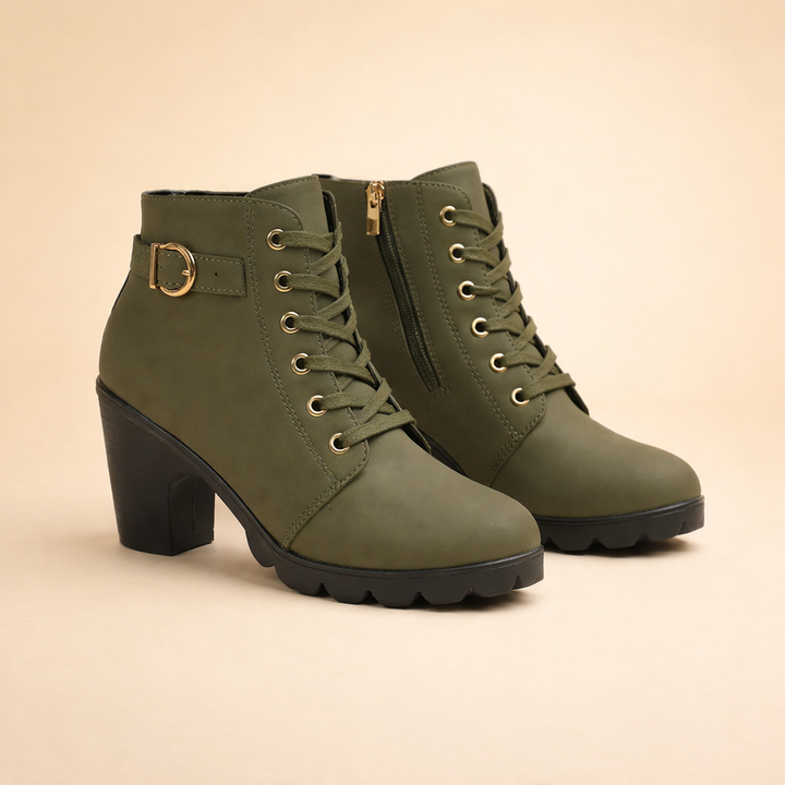 Edgy women's black chunky heel ankle boots with lace-up and buckle detail, stylish winter and autumn footwear.
