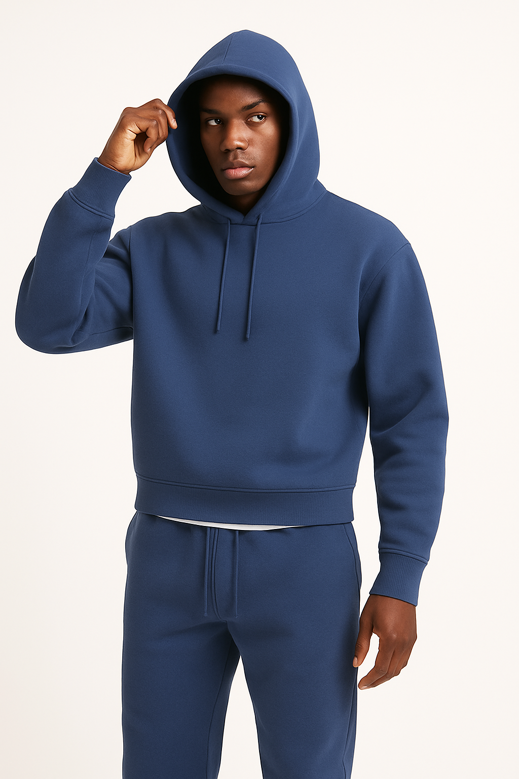 Front view of a men's long-sleeve pullover hoodie with adjustable drawstring hood, perfect for casual & loungewear.