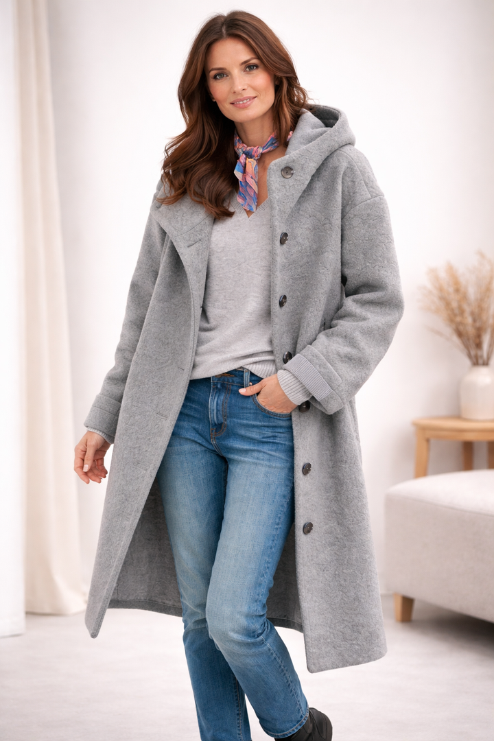 Versatile women's elegant transitional coat. Long-sleeve, chic button-front outerwear for autumn & winter fashion.