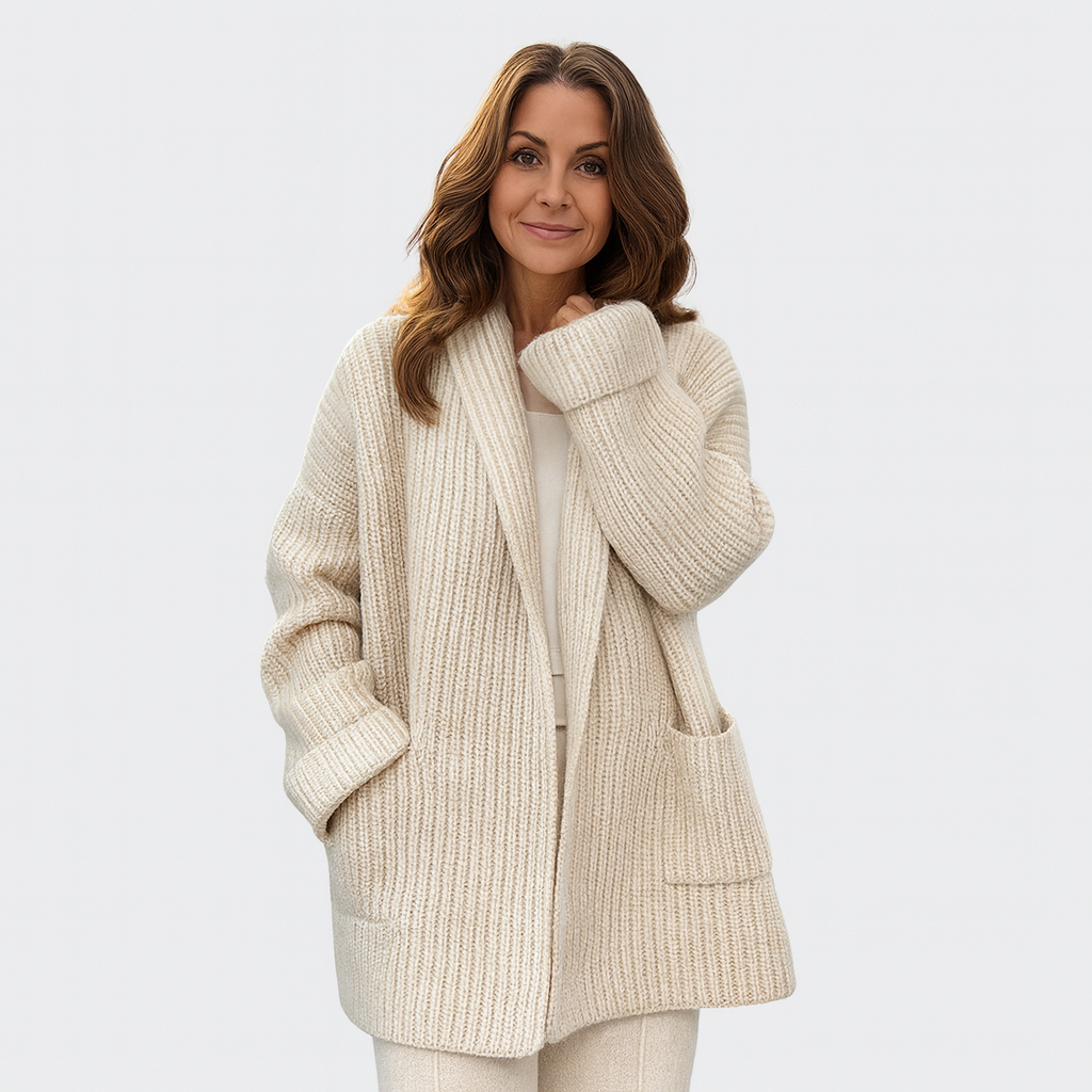 Elegant women's oversized open front beige cardigan. Soft knit, relaxed fit, ideal for fall & winter warmth.
