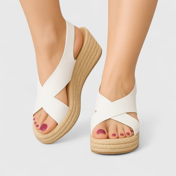 Elegant women's summer wedge sandals. Comfortable orthopaedic design with open toe & adjustable buckle for everyday wear.