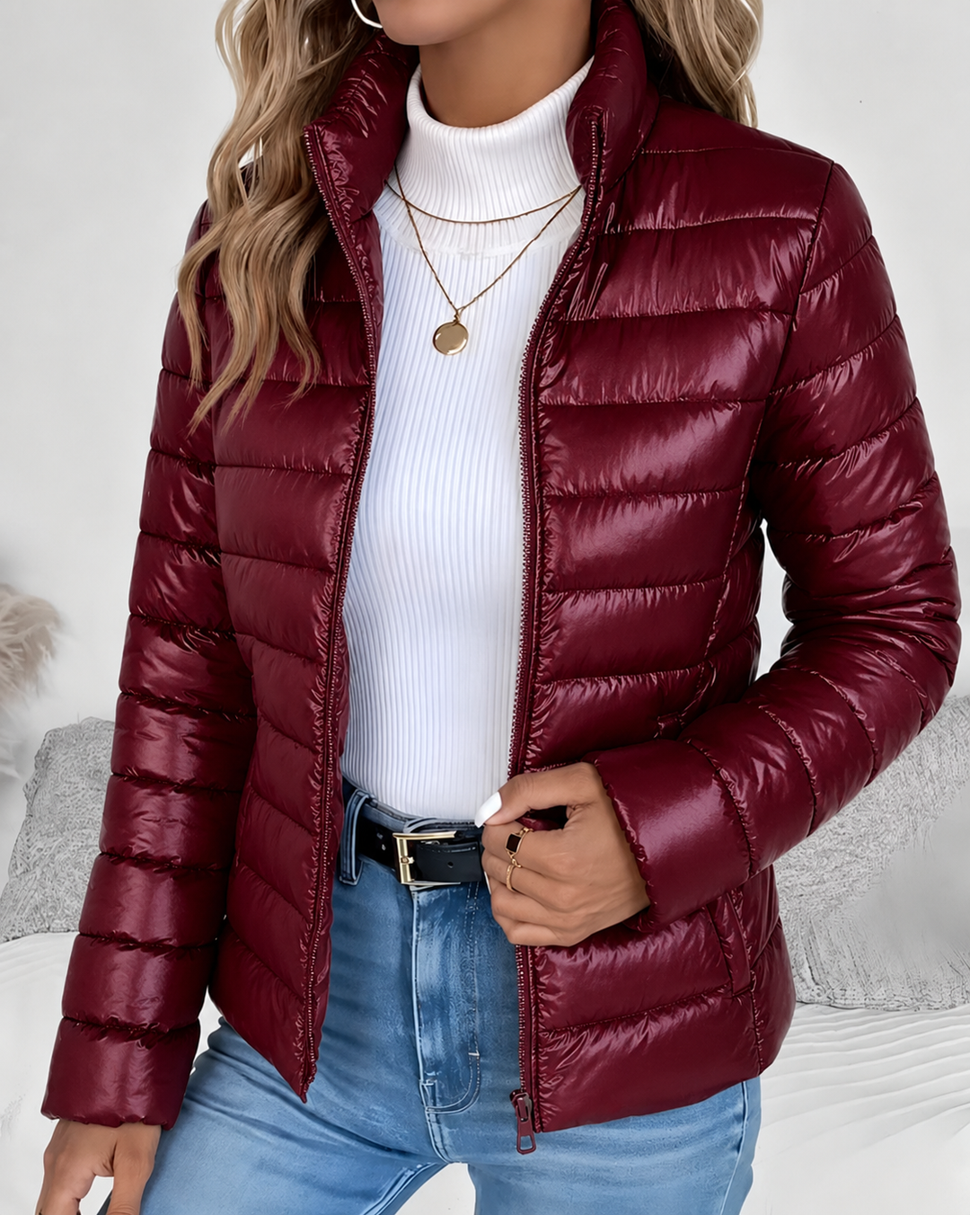 Essential women's cropped puffer jacket. Lightweight design with a stand collar, perfect for cool weather.