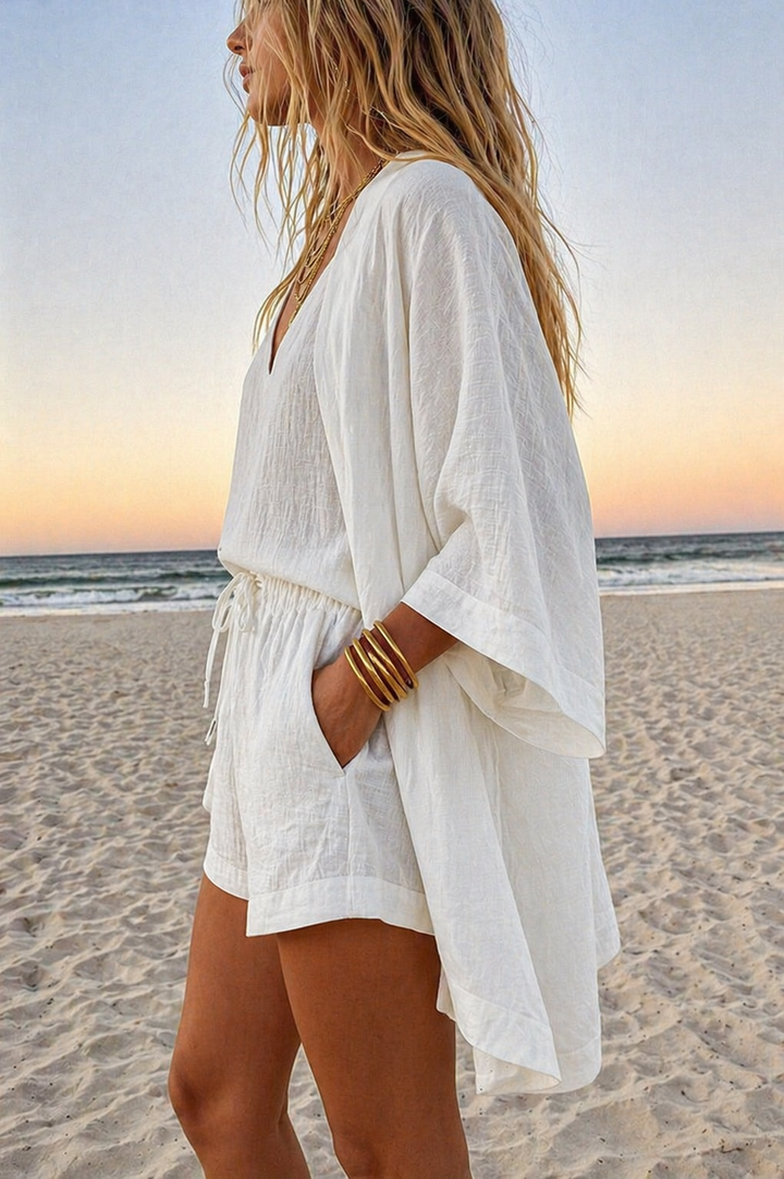 Lightweight women's summer outfit set: elegant kimono, sleeveless top, and drawstring shorts for comfort & style.