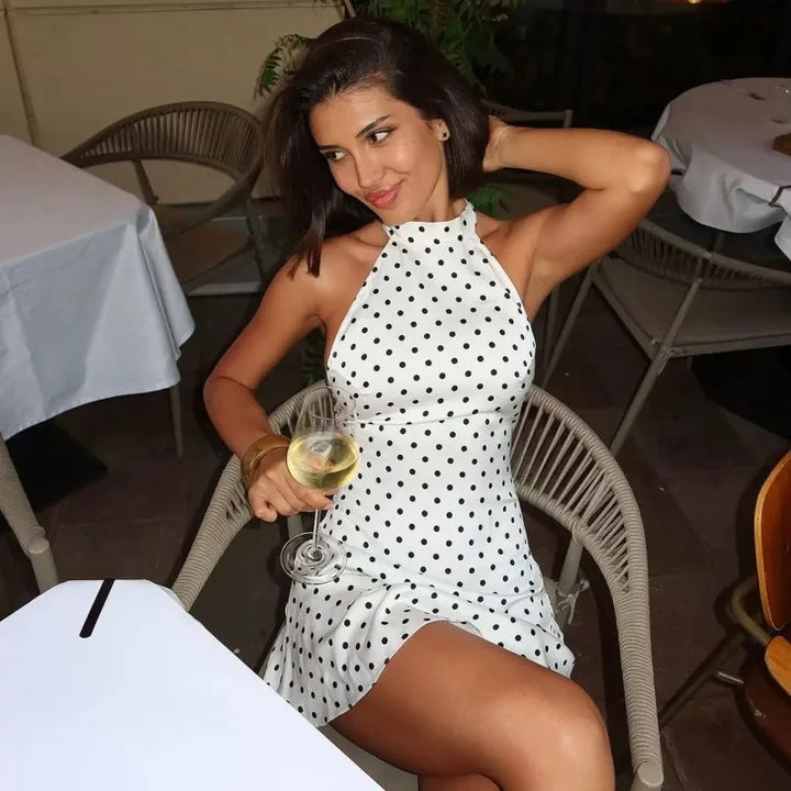 Women's polka dot halter bodycon mini dress. Perfect sleeveless party or cocktail evening wear.