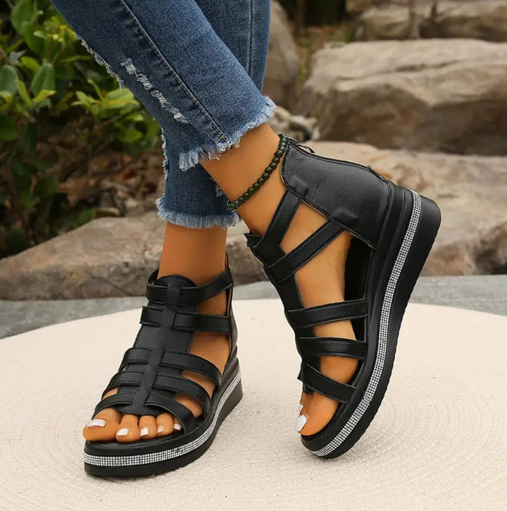 Fashionable women's wedge sandals, perfect party or evening footwear with an elegant touch.