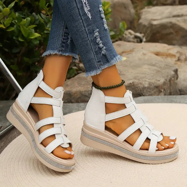 Stylish women's wedge sandals for spring/summer, elegant fashion footwear.