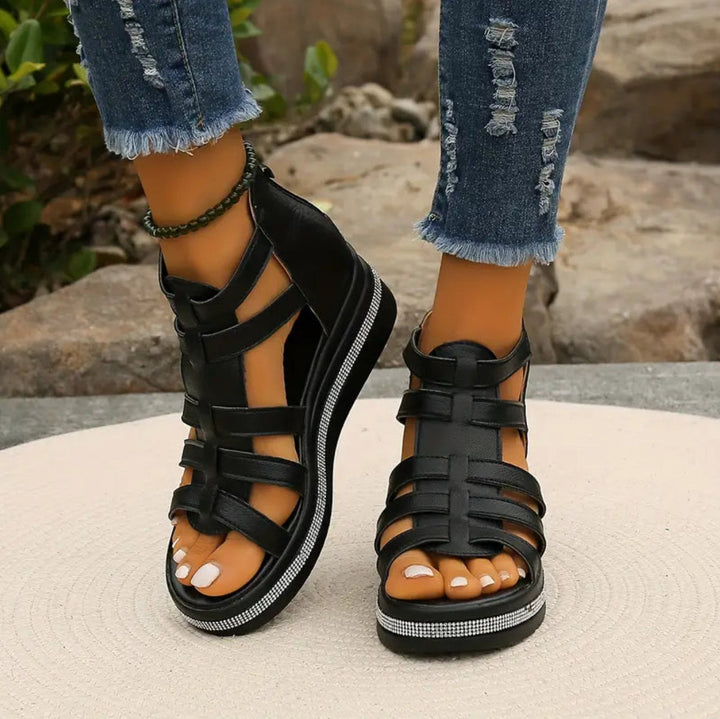 Women's sophisticated wedge sandals with glittering accents, ideal for elegant evening events.