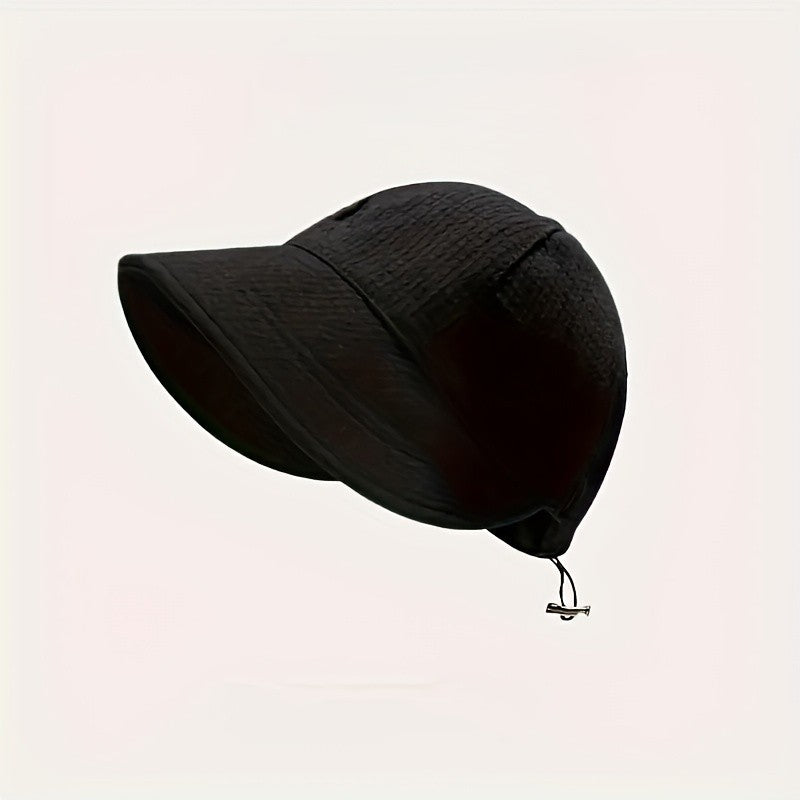 Fashionable women's sun hat with UPF protection. Features an adjustable drawstring for stylish, secure summer wear.