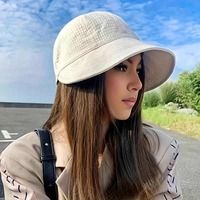 Versatile women's UPF sun hat, featuring a stylish design & adjustable drawstring for a perfect, secure fit.