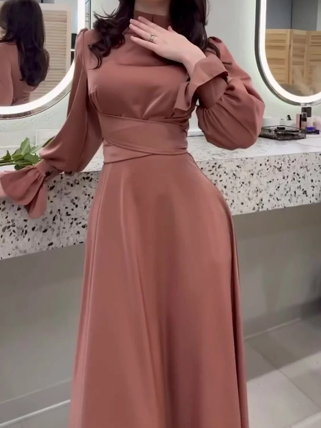 Women's elegant long sleeve maxi dress, a perfect winter party dress or chic holiday outfit.
