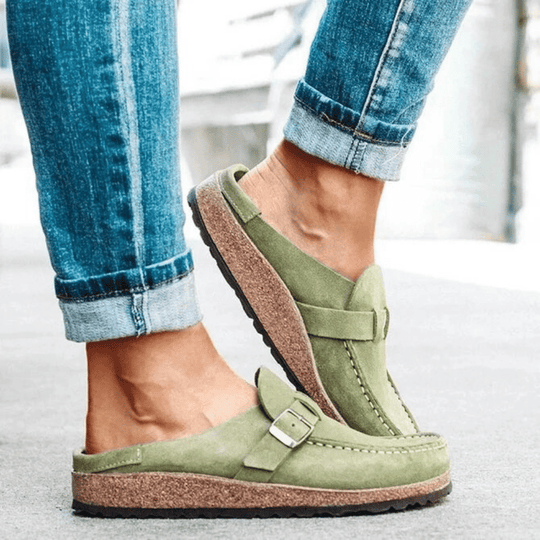Durable women's flats, ergonomic clogs with a comfortable cork sole & moc toe for all-day support.