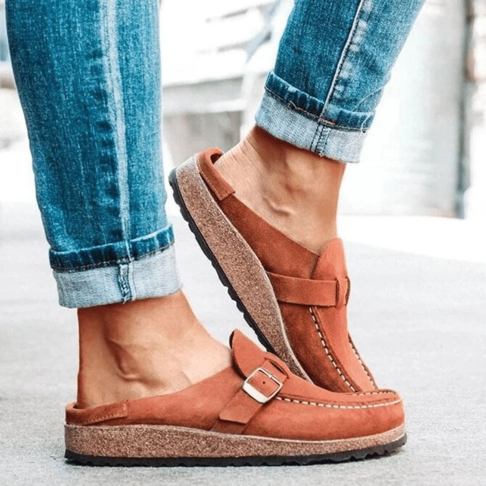 Adjustable women's clogs with an ergonomic fit, comfortable cork sole, and classic moc toe style.