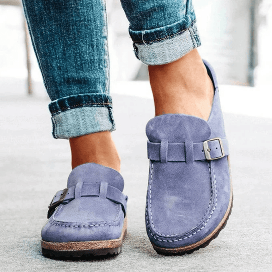 Women's ergonomic slip-on clogs with comfortable cork sole. Ideal casual everyday flats for versatile wear.