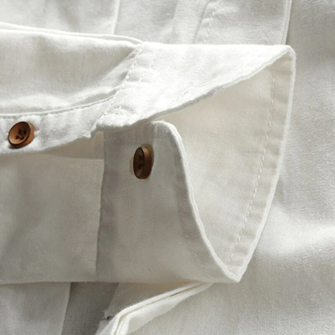 Men's classic long sleeve button-up shirt in a solid color, perfect for versatile, comfortable everyday wear.
