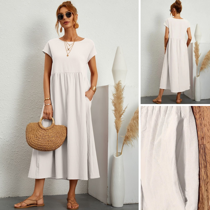 Back view: Simple yet elegant women's loose maxi dress, comfortable and flowy with a high round neck.