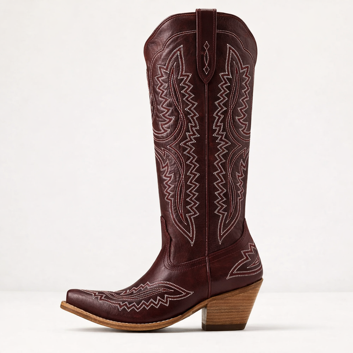 Well-fitting women's patterned zipped tall boots, pointed toe, providing comfort and style for daily wear.