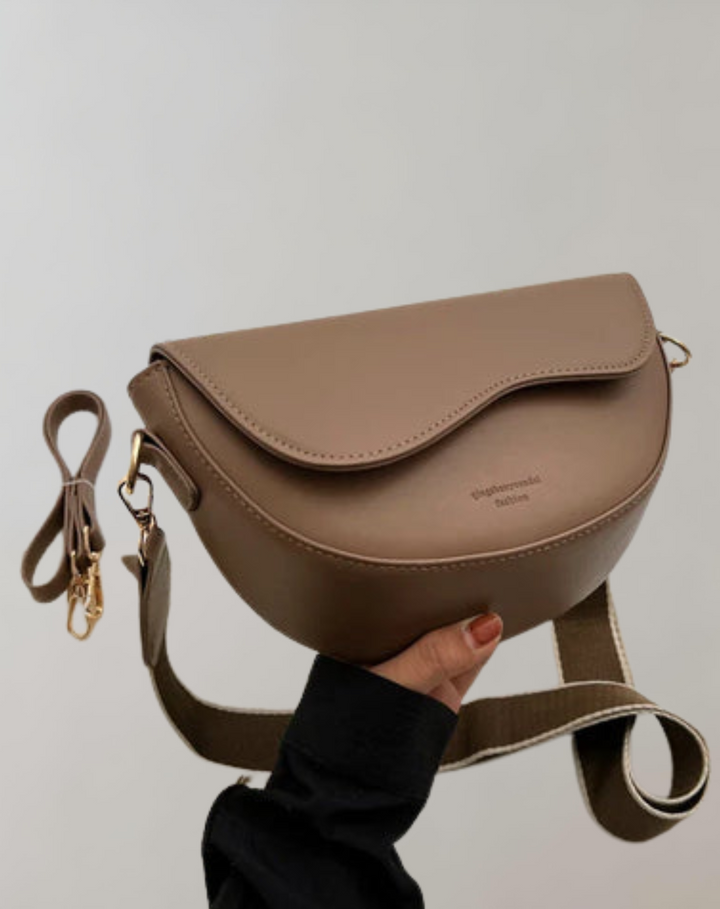 Chic women's crossbody bag in versatile style, perfect for daily use & fashion convenience.