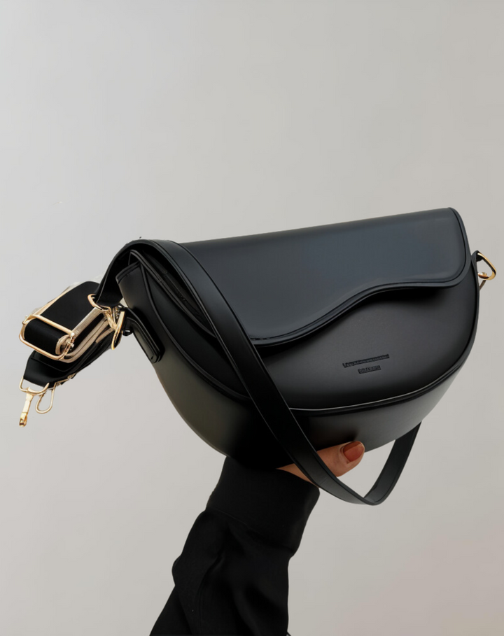 Black women's elegant crossbody bag, perfect for daily style & a versatile fashion accessory.