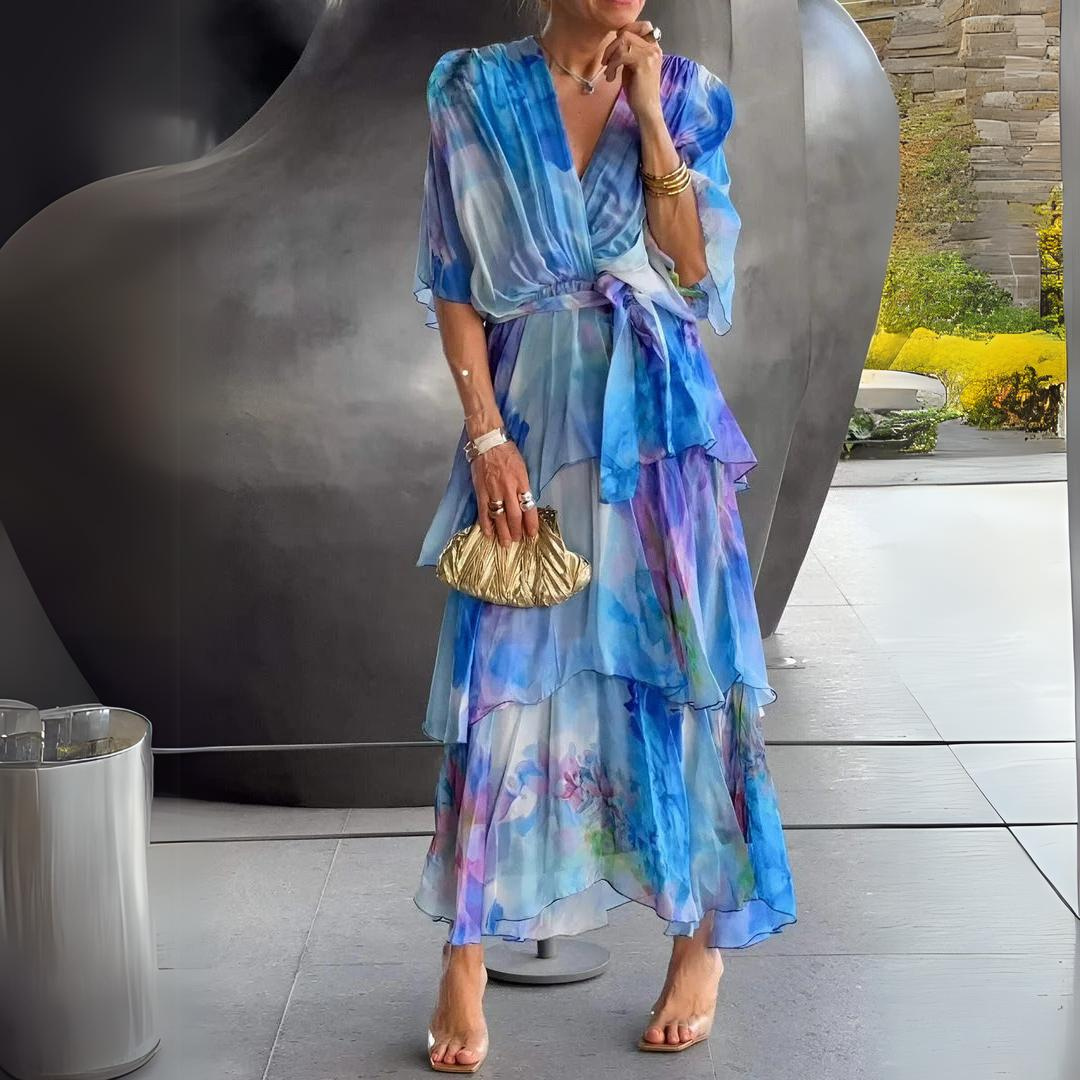 Elegant women's blue draped cocktail dress, perfect for parties & special occasions. Sophisticated evening wear.