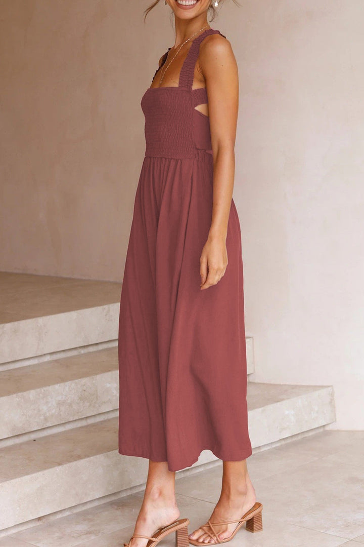 Stylish women's summer midi dress with adjustable crisscross tie-back, embodying chic wear.