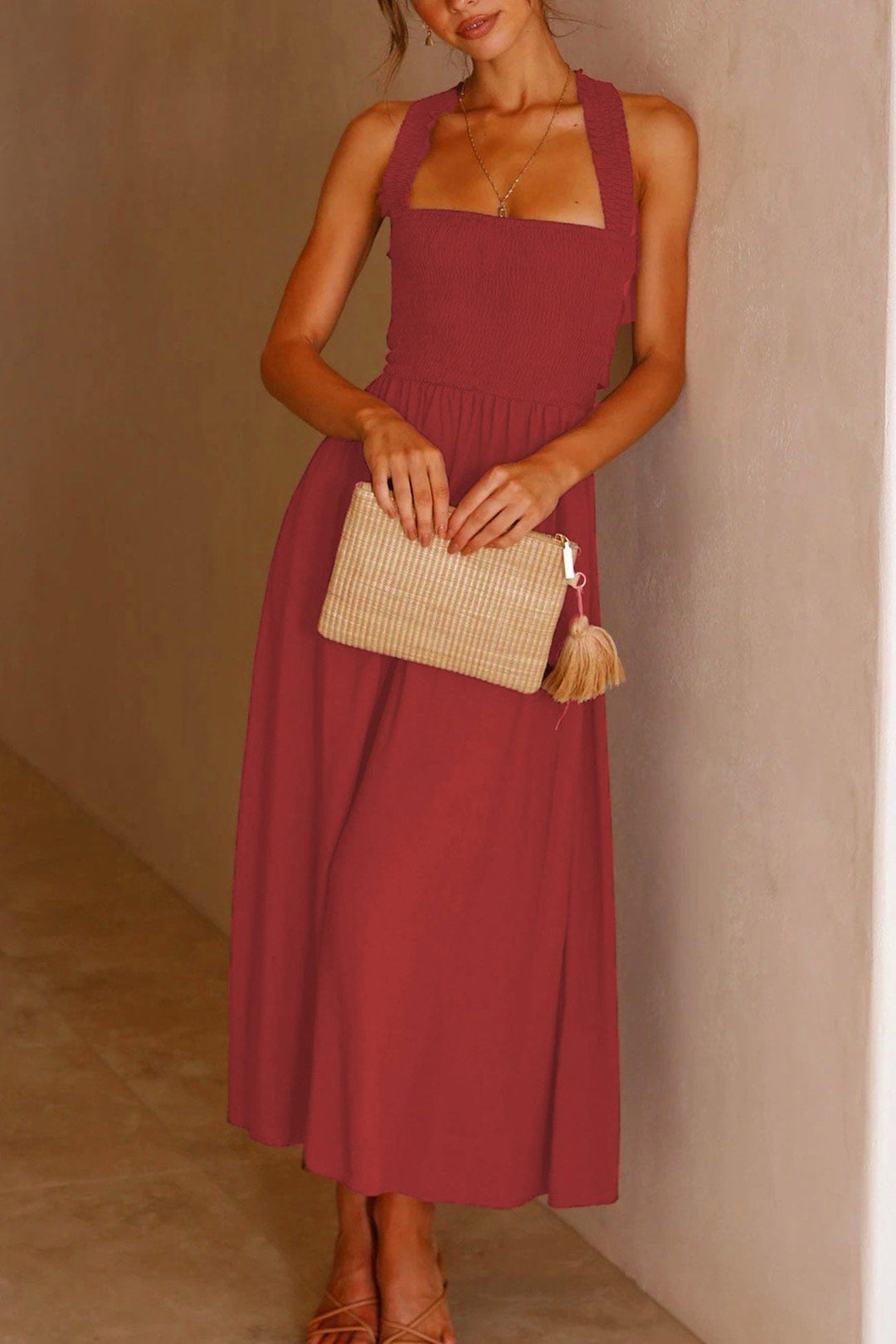 Women's elegant midi dress, a versatile piece with a stunning crisscross tie-back design.