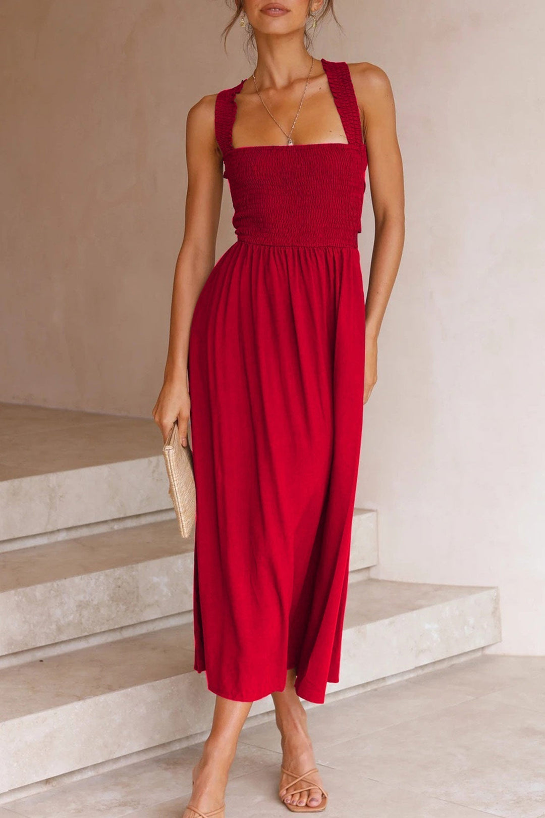 Party-ready women's midi dress. Elegant crisscross tie-back adds a touch of sophistication.