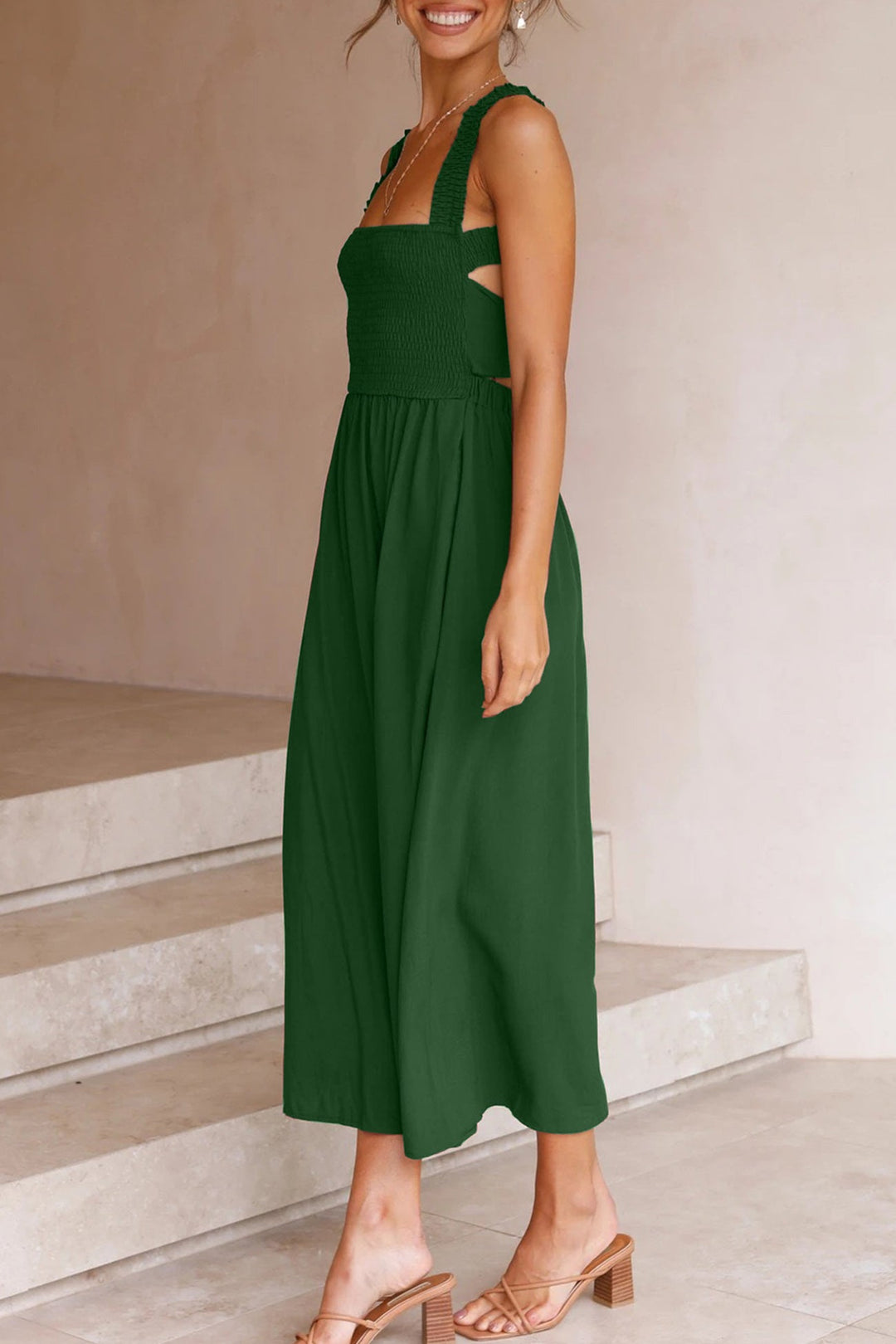 Close-up of the crisscross tie-back detail on a women's versatile midi dress, elegant & adjustable.