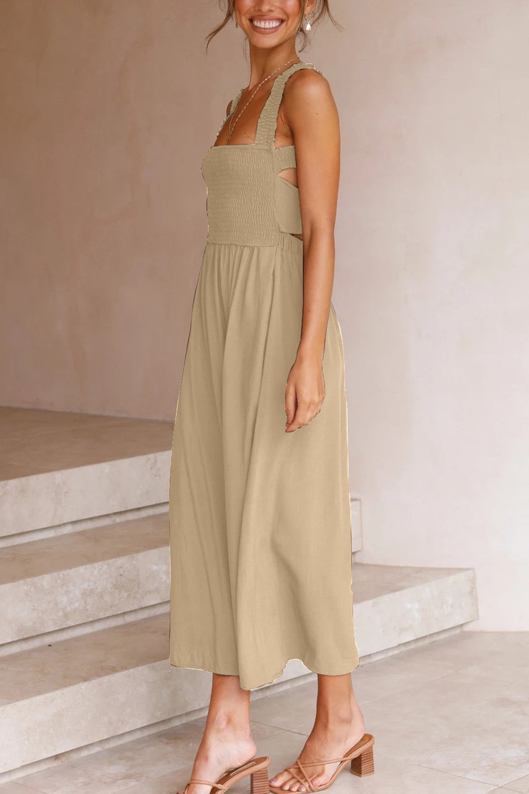 Sophisticated women's party midi dress, designed with a crisscross back and adjustable tie-back.