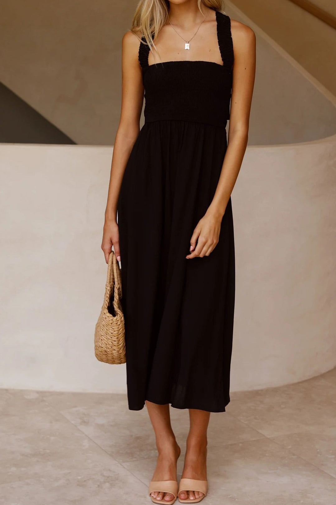 Fashionable women's midi dress with intricate crisscross back and tie-up detail, summer essential.