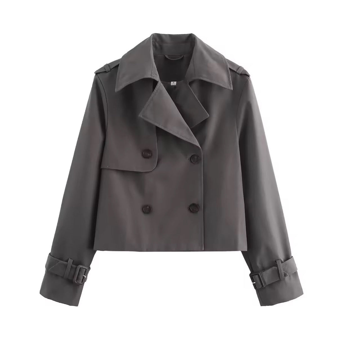 Elegant women's cropped trench coat for sophisticated style. Perfect spring jacket or fall outerwear.