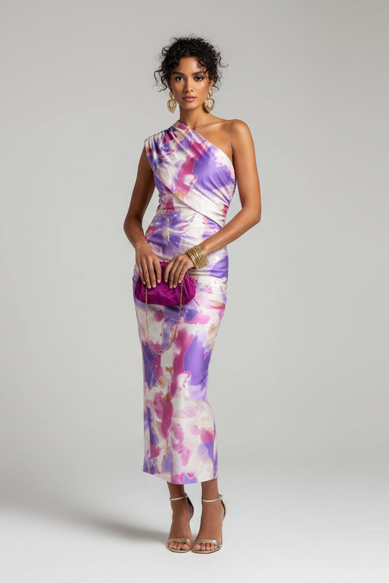Vibrant flowy colorful women's dress, perfect for summer parties or a stylish vacation look.