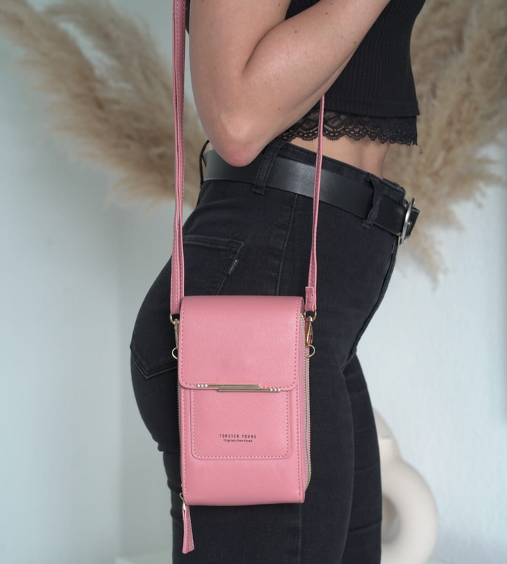 Elegant women's crossbody bag with touchscreen phone pocket, made from durable PU leather.