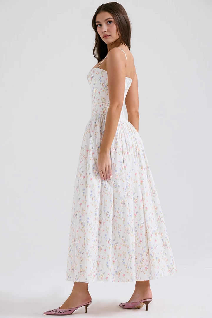 Stylish women's floral midi dress, ideal for elegant summer events or casual sunny outings.