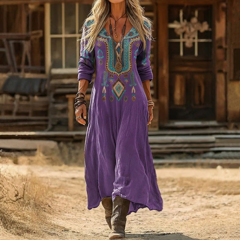 Elegant women's purple long sleeve V-neck dress for casual everyday wear. Comfortable, flowy, vintage style perfect for spring.