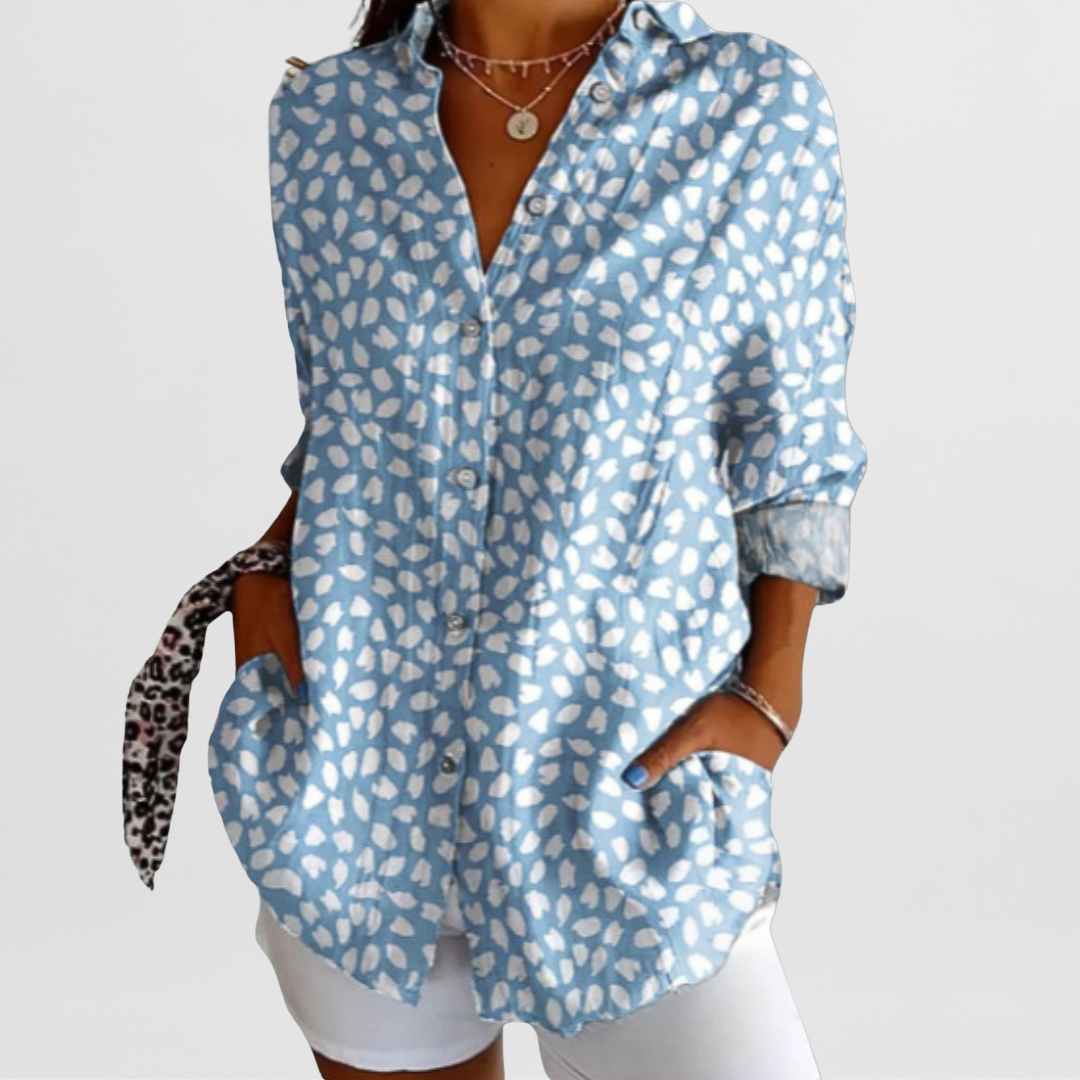 Vibrant ladies' tropical floral loose fit blouse with long sleeves & button front, perfect for casual summer style.
