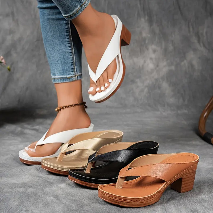 Fashionable ladies' heeled sandals with block heels, ensuring comfortable and elegant wear throughout the day.