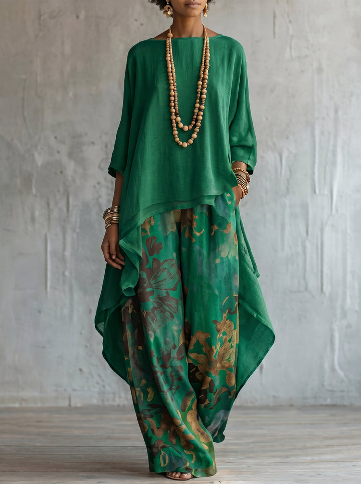 Chic women's floral co-ord set featuring an elegant tunic top & wide-leg trousers. Ideal two-piece for summer fashion.