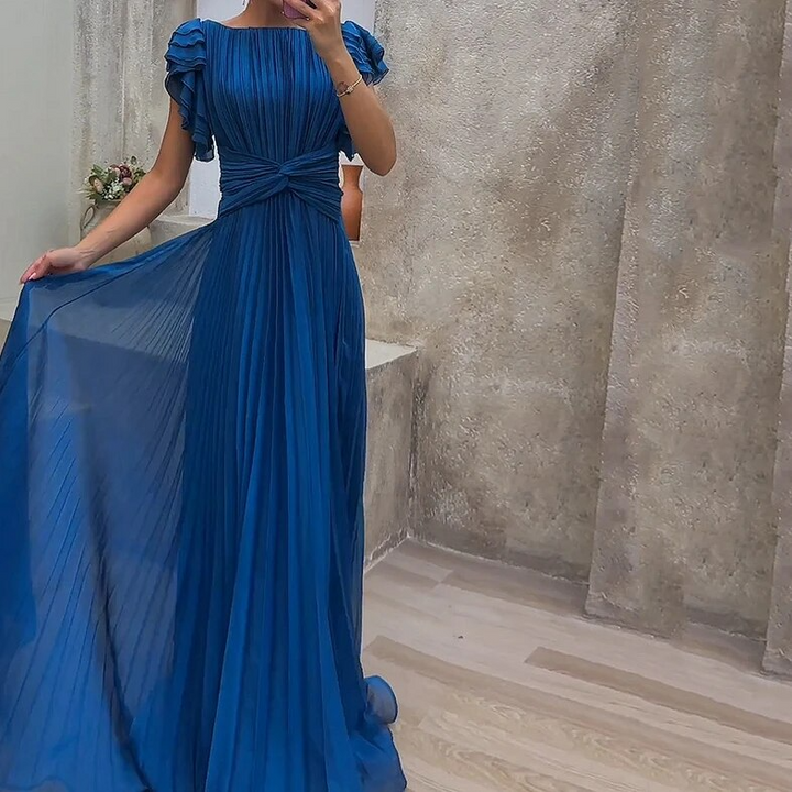 Graceful women's formal wear: a long ruffle evening gown, perfect for any special occasion.