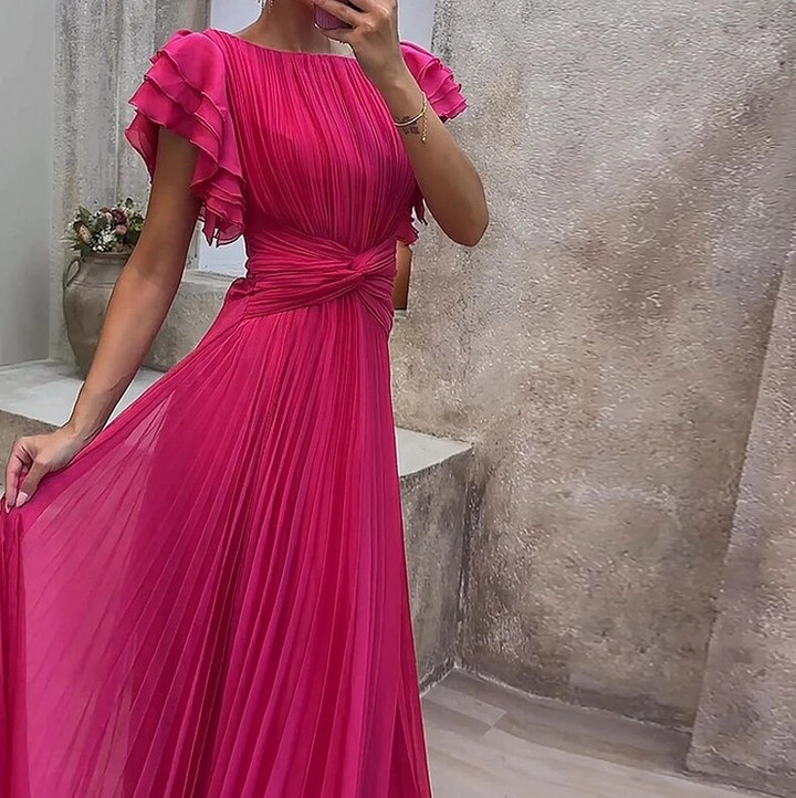 Beautiful long formal gown with ruffles for women, ideal for special occasion wear.