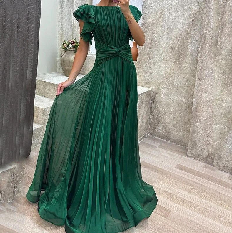Formal women's long party dress, an elegant ruffle maxi gown for special occasions.