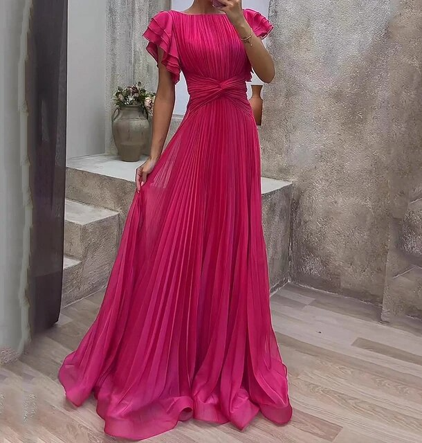 Stylish women's party dress; a colorful ruffle maxi gown for evening events.