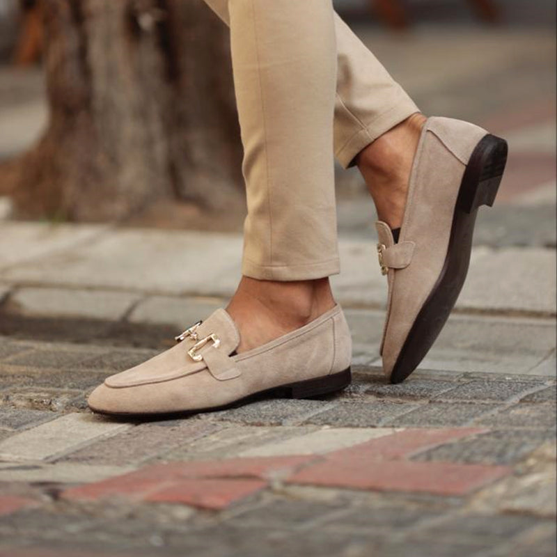 Elegant men's beige horsebit slip-on loafers. Stylish dress shoes for smart casual, formal, and comfortable everyday fashion.