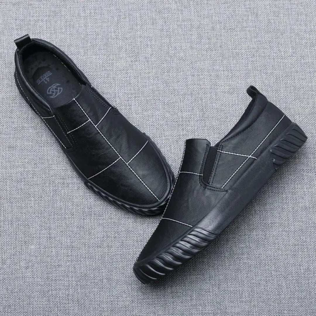 Durable men's casual loafers, comfortable slip-on shoes with trendy contrast stitching for any occasion.