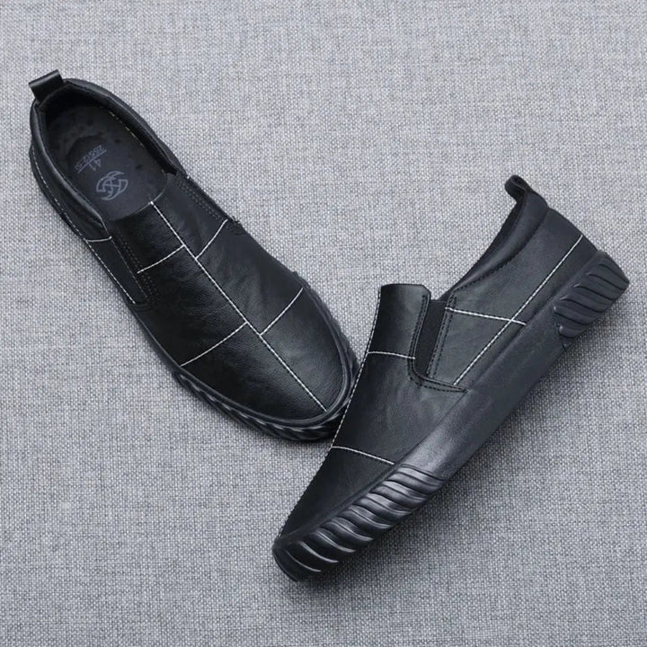 Durable men's casual loafers, comfortable slip-on shoes with trendy contrast stitching for any occasion.