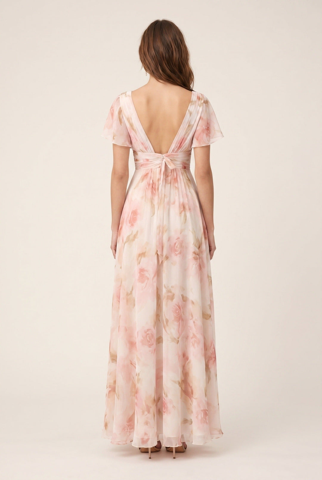 Stylish women's floral maxi dress with elegant V-neck & flutter sleeves, ideal for summer occasions & spring fashion.