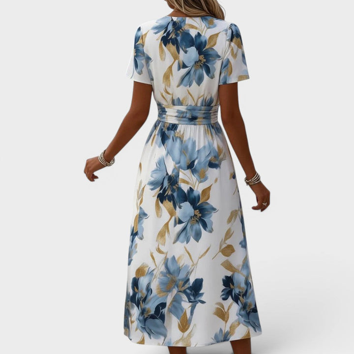 Flattering women's floral wrap midi dress with elegant long sleeves, perfect versatile summer party dress.